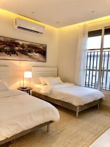 Al Majdiah Residence الماجدية ريزدينس شقة عائلية متكاملة客房内的一张或多张床位
