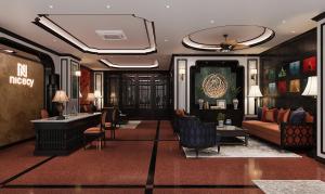 胡志明市Nicecy Boutique Hotel的客厅配有沙发和桌子