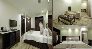 艾哈迈达巴德Regenta Inn Ranip Ahmedabad的酒店客房设有床和客厅。