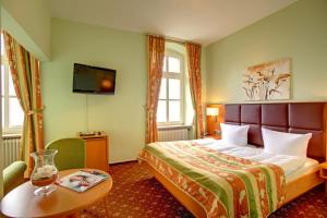 考克斯伯格冰山酒店客房内的一张或多张床位
