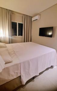 Salinas Exclusive Resort - Apto 1Q客房内的一张或多张床位