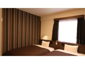 Odawara Terminal Hotel - Vacation STAY 83702v客房内的一张或多张床位