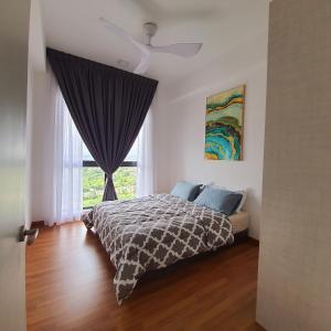 The Glass Homestay Putrajaya客房内的一张或多张床位