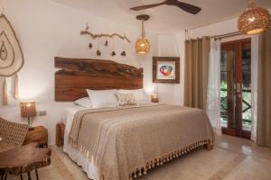 El Corazón Boutique Hotel - Adults Only with Beach Club's pass included客房内的一张或多张床位