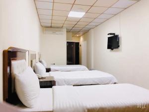 Hotel Sinaia Palace客房内的一张或多张床位