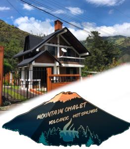 巴尼奥斯Mountain Chalet - Tungurahua Hot Springs/Aguas Termales的前面有标志的房子
