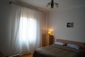 Appartamento Mirandola客房内的一张或多张床位