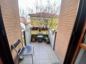 RoncopascoloIntero appartamento - Parma zona Fiera的庭院景阳台植物