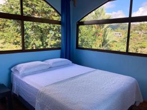 El Paraiso Azul客房内的一张或多张床位
