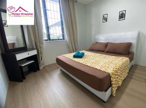 MAWAR HOMESTAY KUCHING客房内的一张或多张床位