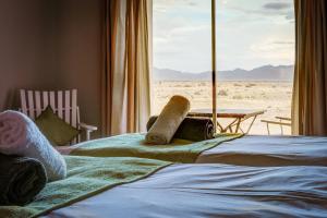 Elegant Desert Lodge客房内的一张或多张床位