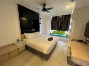 2BR Cozy Space with Living Room hosted by Genting Grandeur客房内的一张或多张床位