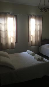 CASA RAIZ cama, café e prosa客房内的一张或多张床位