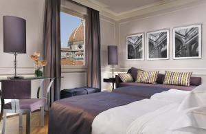 Brunelleschi Hotel客房内的一张或多张床位