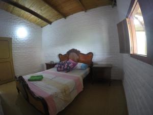 Finca Hermosa Vista客房内的一张或多张床位