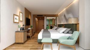 巴克里索莫雷诺港Hotel Indigo - Galapagos, an IHG Hotel的酒店客房,配有一张床、一张桌子和椅子