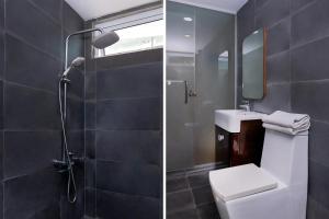 米里Super OYO 977 Hong Kong Suites的带淋浴、卫生间和盥洗盆的浴室