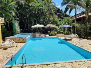 乌巴图巴Canto de Itamambuca的度假酒店的游泳池