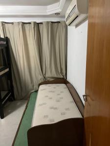 Apartamento Familiar em Campinas 9 solteiros ou 10 se 2 pessoas na cama de casal客房内的一张或多张床位