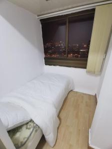 Cloud9 hostel客房内的一张或多张床位