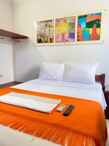 Hotel La Guajira客房内的一张或多张床位