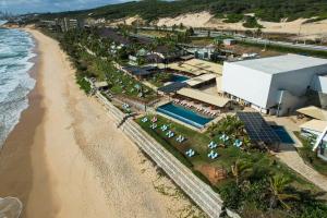 纳塔尔Vila do Mar Natal - All Inclusive的享有度假胜地和海滩的空中景致