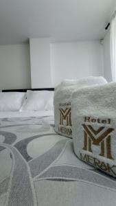 Hotel Meraki Popayán客房内的一张或多张床位