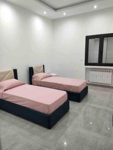 Appartamento di lusso in Tunisia客房内的一张或多张床位