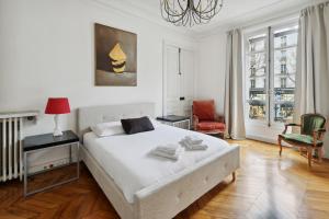 Luxury air-conditioned apartment Champs Elysées - 7 people by Weekome客房内的一张或多张床位