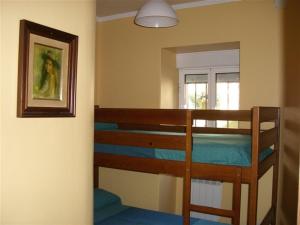 Apartment - 2 Bedrooms - 00119客房内的一张或多张双层床