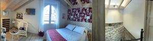 毕斯卡斯卡萨尔萨巴拉公寓酒店的一间卧室设有一张床,墙上设有窗户