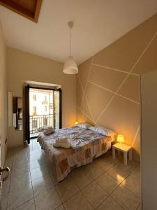 贝内文托Casa Gian的一间卧室,卧室内配有一张大床