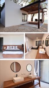 利巴诺伊Rajapruek Samui Resort - SHA Plus的现代化的卧室配有床和镜子