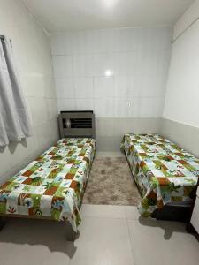 Casa Bairro Boa Vista 1客房内的一张或多张床位
