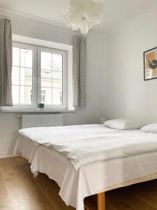 Słoneczne mieszkanie客房内的一张或多张床位