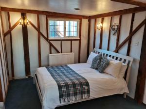 Retreats at Stansted Manor客房内的一张或多张床位