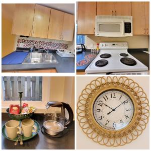 温哥华Sunshine Suite的一个厨房的四张画作,上面有时钟