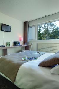 贝拉姆布拉乐诺尔蒙特度假酒店客房内的一张或多张床位