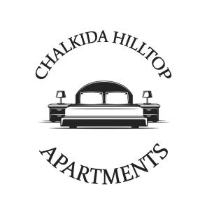 哈尔基斯Chalkida Hilltop Apartments的黑白的标志,带有空想字的床铺