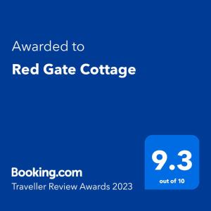 班克拉那Red Gate Cottage的红色大门小屋的屏幕图,上面有红色大门咖啡的文本