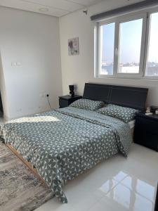 Al Qalah flats客房内的一张或多张床位