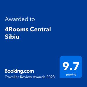锡比乌4Rooms Central Sibiu的蓝色的屏幕,文字被授予客房中央slulu