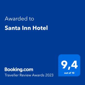巴拉奈里奥-坎布里乌Santa Inn Hotel的桑塔酒店标有蓝屏文字