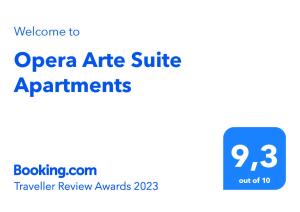 雷卡纳蒂港Opera Arte Suite Apartments的标牌显示开放式套房公寓拥有蓝色的广场