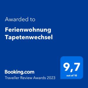 德累斯顿Ferienwohnung Tapetenwechsel -Balkon-的手机屏幕的截图,上面的文本被授予