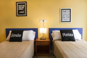 迪拉马尔旅馆客房内的一张或多张床位