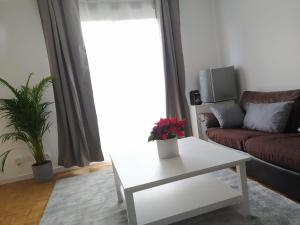 Chambres dans guest house à Lyon-GARE Part-Dieu的休息区