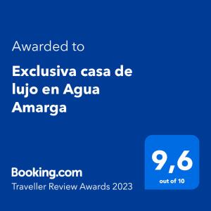 阿瓜阿马加Exclusiva casa de lujo en Agua Amarga的给exiliaza casa的文本的手机的截图