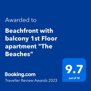 韦茅斯Beachfront with balcony 1st Floor apartment "The Beaches"的手机的屏幕,文字升级到浴室,浴室地板