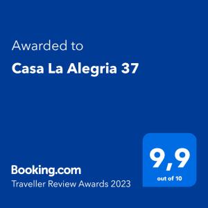 马拉加Casa La Alegria 37的蓝色屏幕,文字被授予casa la algebraias